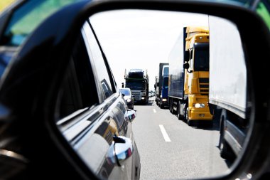 Truck traffic jam on highway clipart