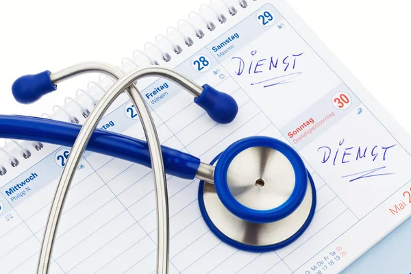 Stethoscope and calendar. doctor's appointment — Stock Photo, Image