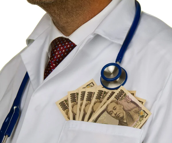 Doctor with japanese yen bank notes — Stock Photo, Image