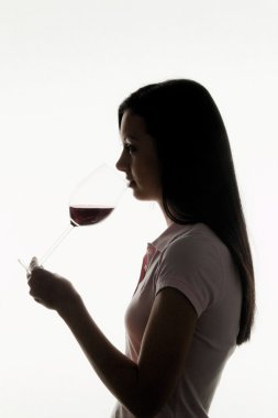 Woman with wine glass for wine tasting clipart