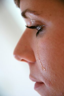 Woman with tears in her face clipart