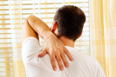 Man with back pain clipart