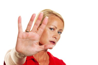 Woman holding hands against her face. clipart