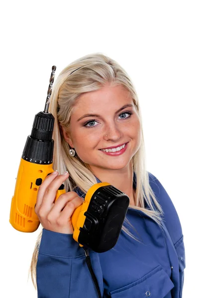 Woman in blue work clothes with drill — Stock Photo, Image