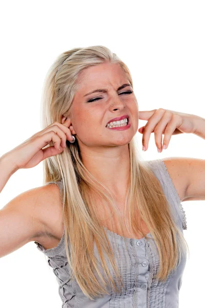 Kobieta cierpi z powodu hałasu — Zdjęcie stockowe