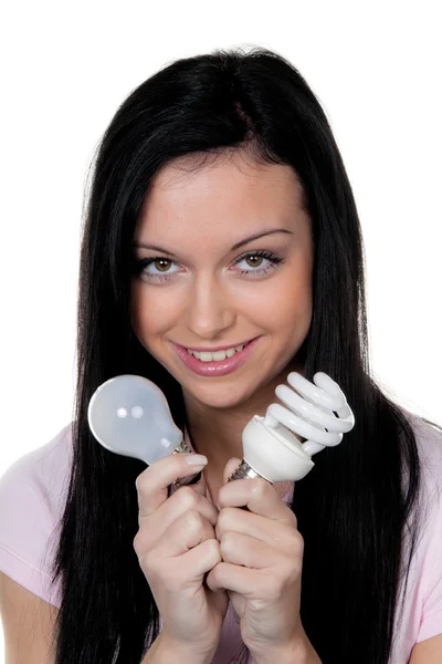 Frau mit Energiesparlampe. — Stockfoto