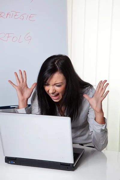 Young woman with computer — Stock Photo, Image