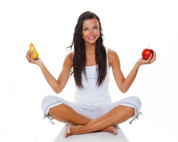 Young woman with apple and pear — Stock Photo, Image