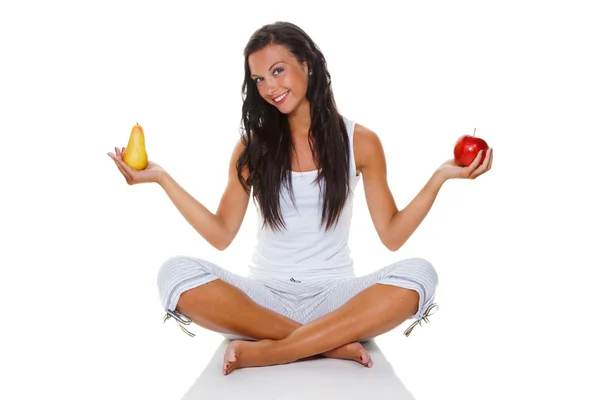 Junge Frau mit Apfel und Birne — Stockfoto