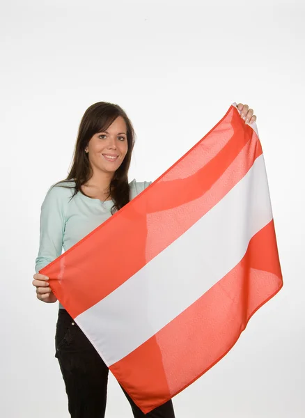 Μια νεαρή γυναίκα με μια εθνική σημαία — Φωτογραφία Αρχείου