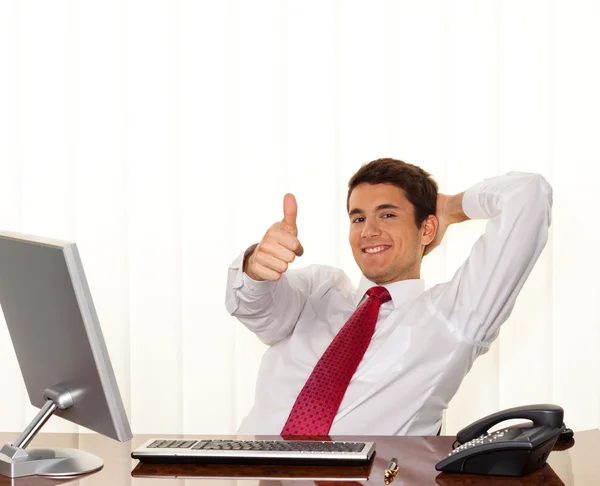 Successful managers sitting at desk — Stock Photo, Image