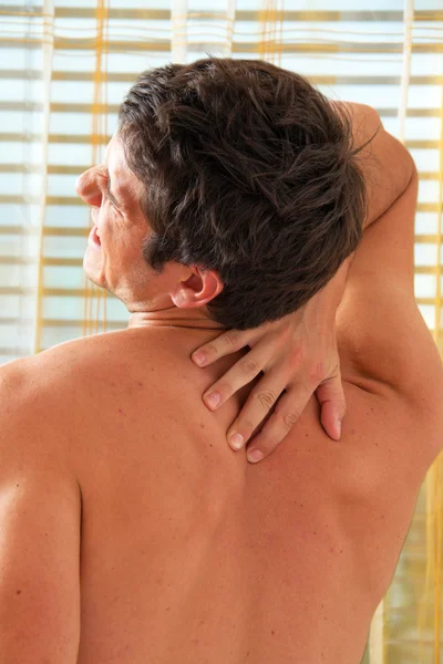 Pain in the back. — Stock Photo, Image