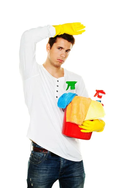 Człowiek z płynem czyszczącym. sprzątanie mieszkania. — Zdjęcie stockowe