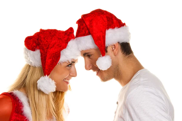 Paar für Weihnachten mit Mützen — Stockfoto