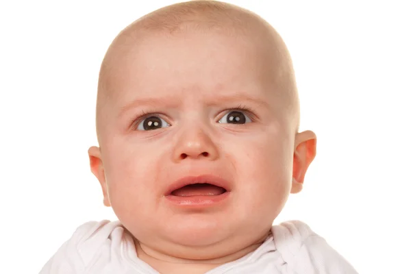 Cara de um bebê chorando, triste — Fotografia de Stock