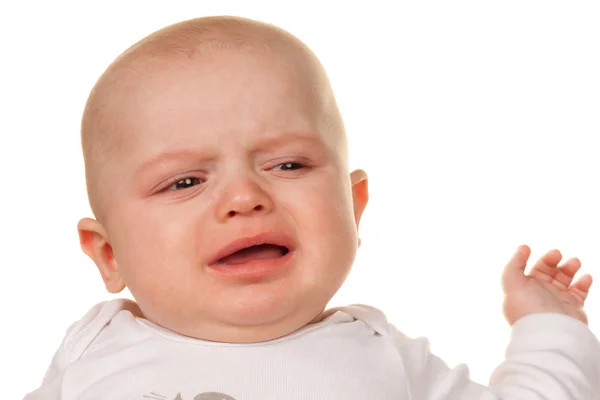Visage d'un bébé triste et pleurant — Photo