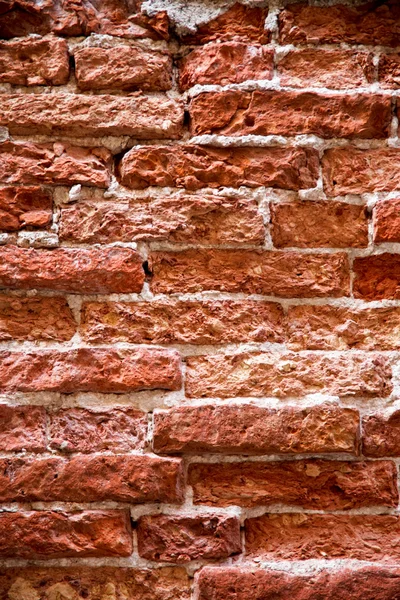 Eine Ziegelmauer als Hintergrund — Stockfoto