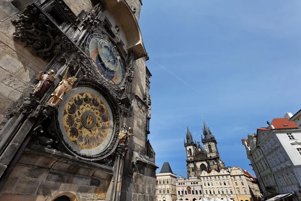 Prague astronomical clock and the church of the virgin mary — Stock Photo, Image