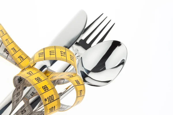 Cutlery with tape. symbol diet. — Stock Photo, Image