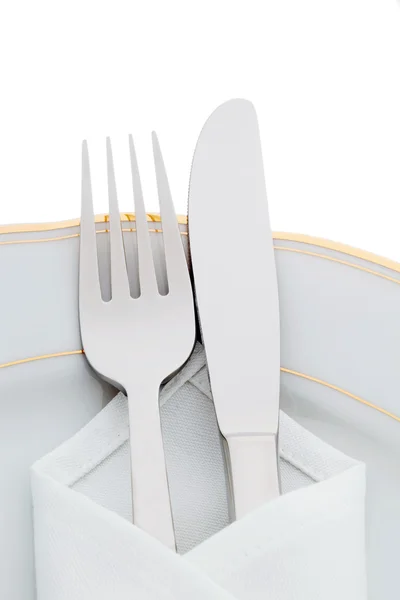 Ножи, вилки и тарелки — стоковое фото
