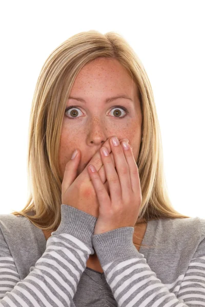 Unsuspecting woman is stunned Royalty Free Stock Images