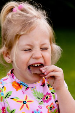 Child from eating chocolate clipart