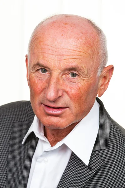 Portrait of a friendly older man — Stock Photo, Image