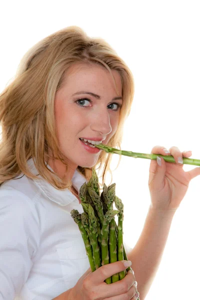 Mulher com espargos verdes — Fotografia de Stock