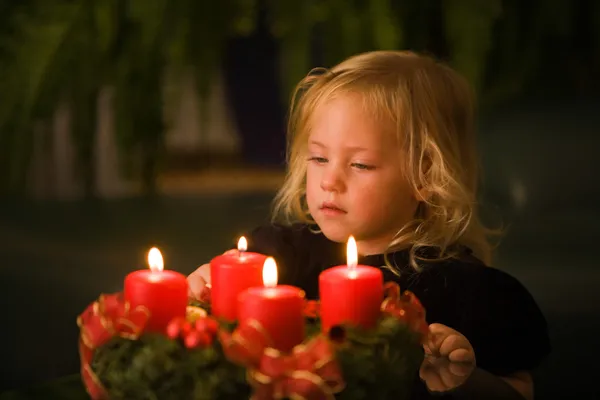 stock image Child with advent wreath for christmas