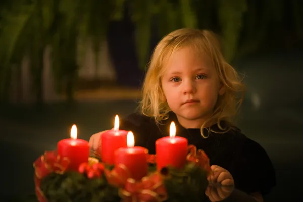 stock image Child with advent wreath for christmas