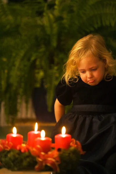 stock image Child with advent wreath for christmas