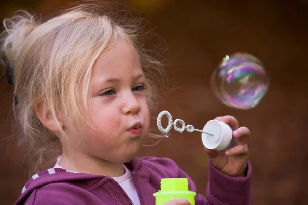 Child with bubbles — Stock Photo, Image