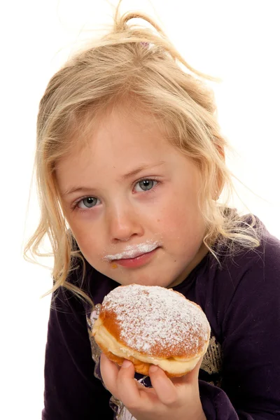 Dziecko w karnawale z pączków. pączki — Zdjęcie stockowe