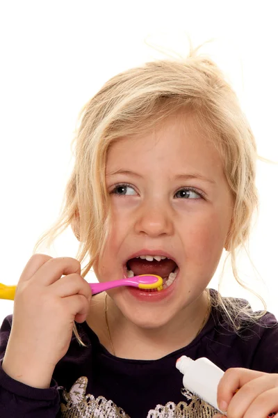 Dítě během zubů. kartáček a zubní pasta Stock Snímky