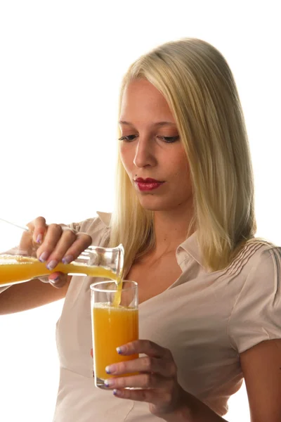 Portakal suyu olan kadın. — Stok fotoğraf