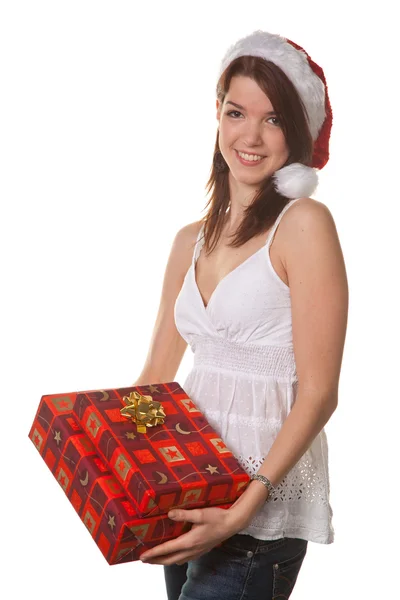 Pretty young woman with christmas package — Stock Photo, Image