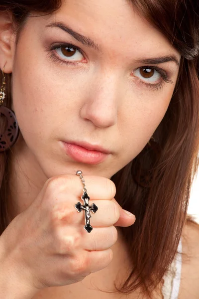 Girls praying hands with a cross — Stock Photo, Image