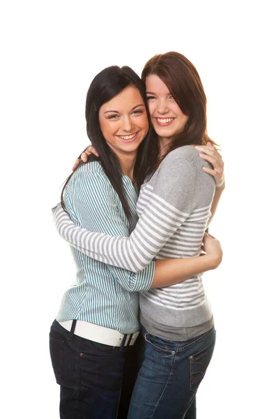 Two girlfriends in a tender embrace — Stock Photo, Image