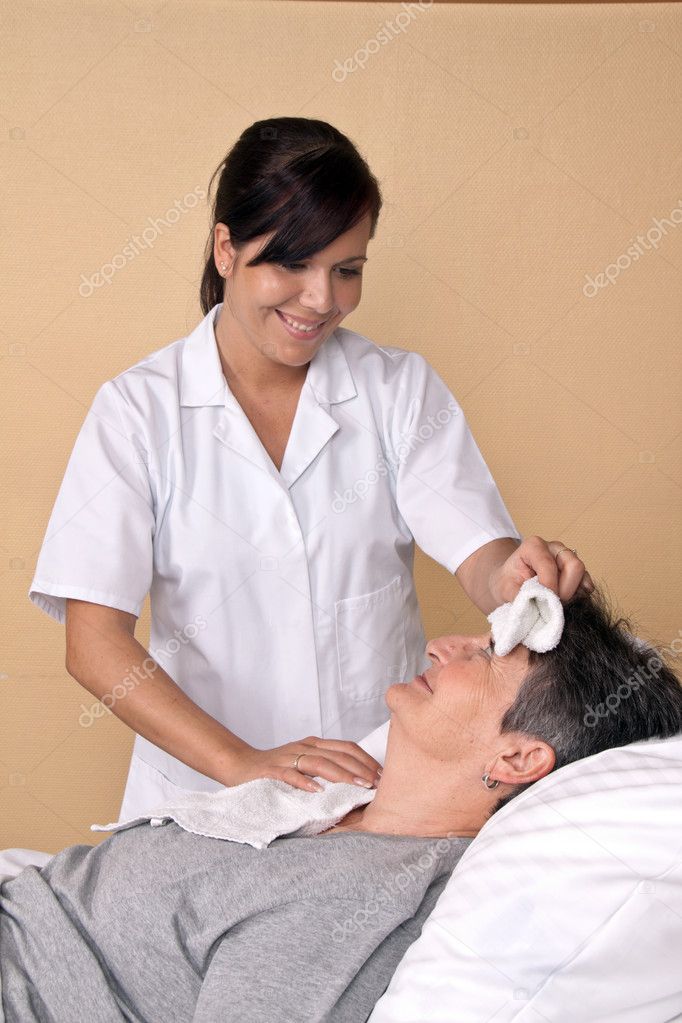 Nurse washing a patient Stock Photo by ©ginasanders 8271909