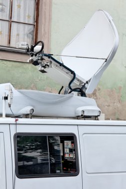 Live television broadcast vehicles for reportage clipart
