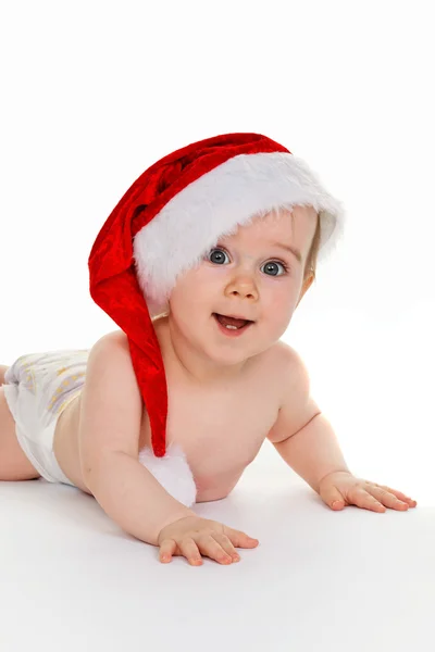 Lilla baby barn med jultomten hatt — Stockfoto