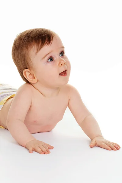 I bambini piccoli in pannolini bambino si trova a terra — Foto Stock
