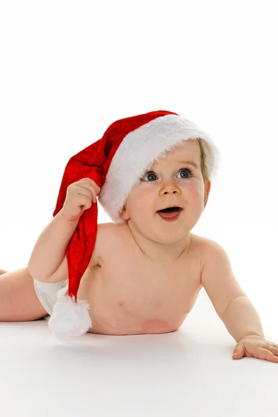 Lilla baby barn med jultomten hatt — Stockfoto