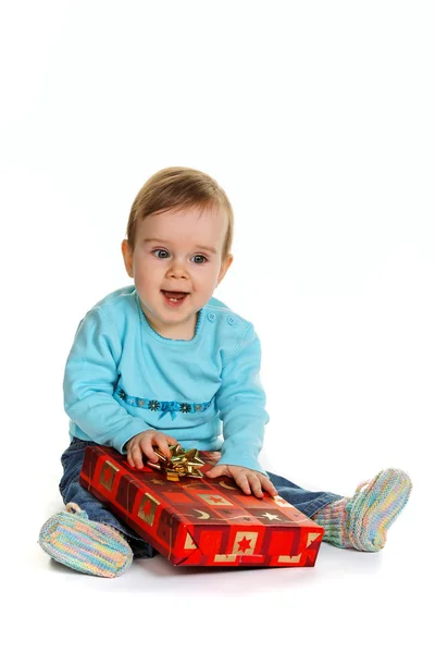 stock image Small child with a birthday gift package