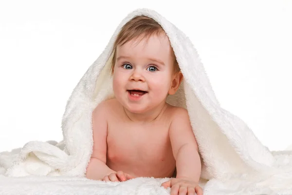 Pequeno cobertor de bebê criança surpreso — Fotografia de Stock