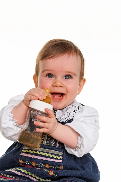 Malé dítě s lahví nápoje — Stock fotografie