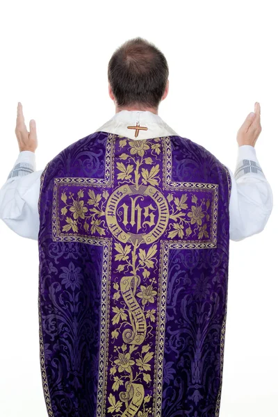 Catholic priest prays — Stock Photo, Image