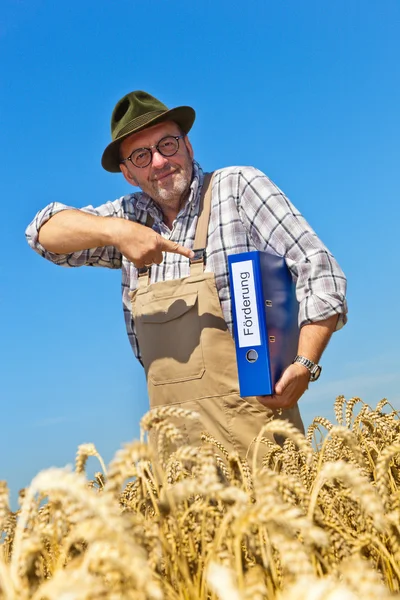 Farmář s portfoliem "propagace" na krabici — Stock fotografie