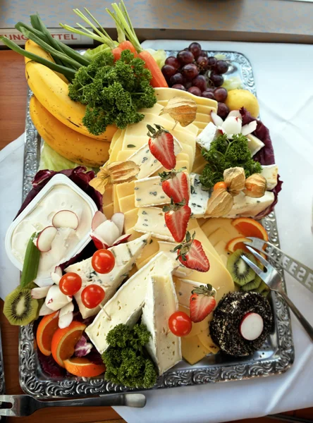 stock image Cheese plate with a cold buffet