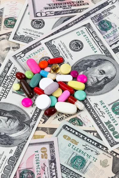 stock image Costs for health, tablets and dollar bills